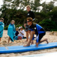Learn to surf near the Laie Courtyard Marriott and PCC
