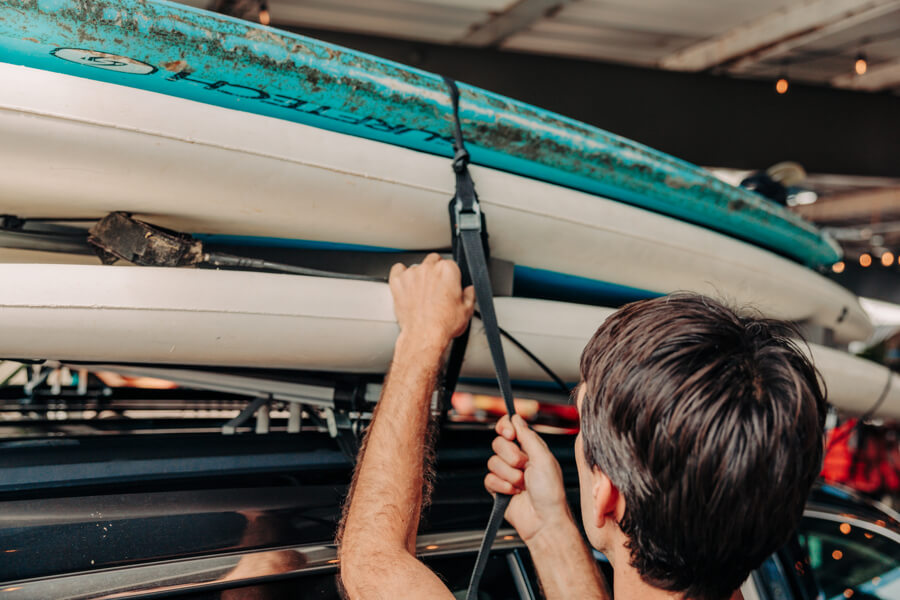 active Oahu staff pull straps tight