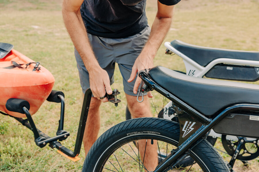 Showing how to attach a kayak trailer to an electric bike.