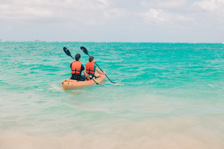 two people kayaking in the ocean at Kailua Beach