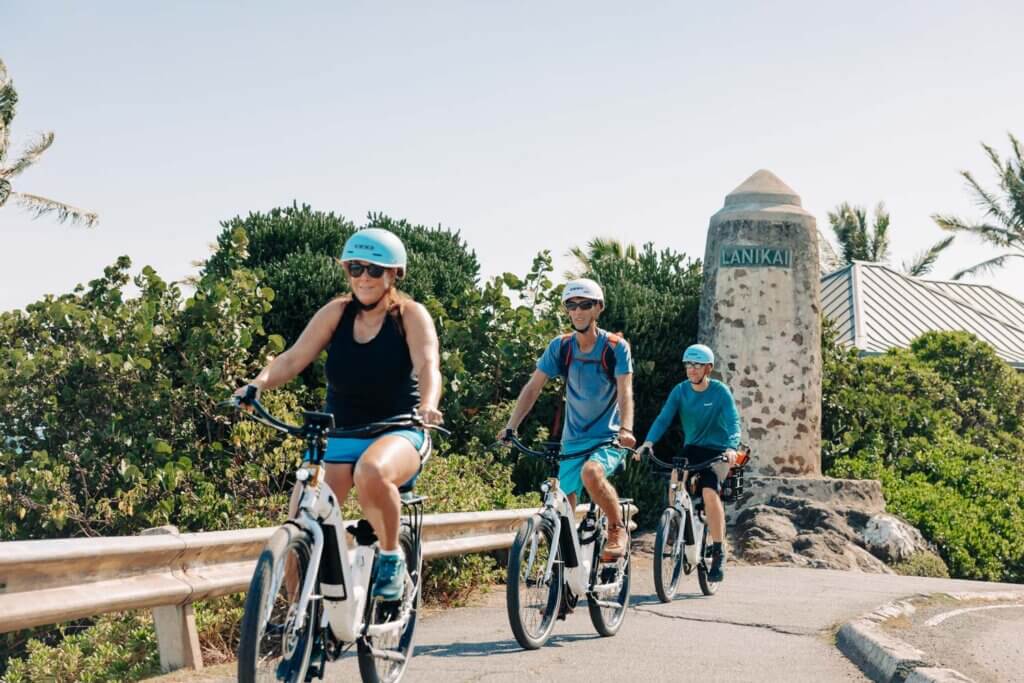 Guests e-bike past Lanikai Monument