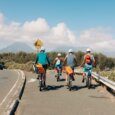 four guests electric biking at a scenic spot in Kailua