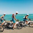 guests e-biking to a scenic lookout in Kailua overlooking the ocean