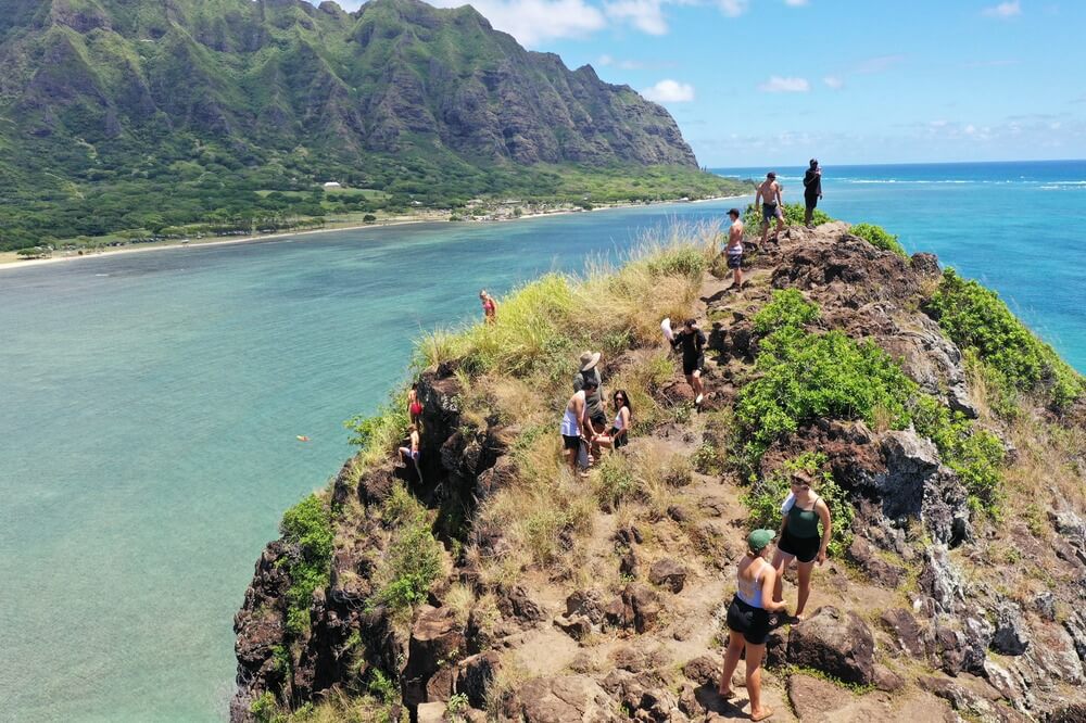 People at the top of Chinaman's hat