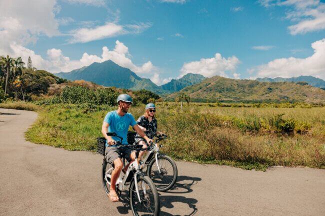 Two people e-bike in kailua, Oahu