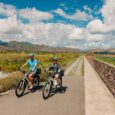 Two people e-bike on the Kailua Marsh Trail